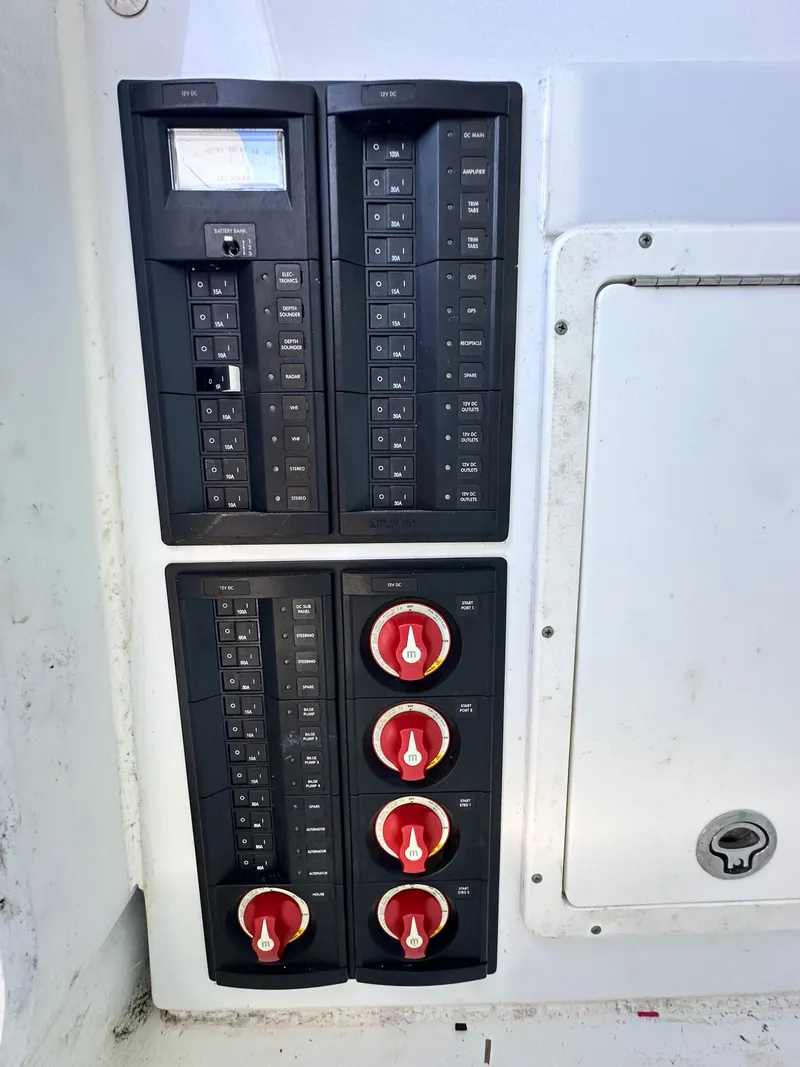 Slide: The Image of Control panel of a 2016 Freeman 37VH boat with switches and dials. - 41
