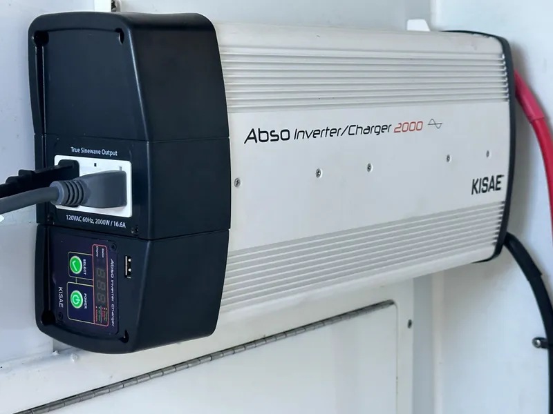 Slide: The Image of KISAE Abso Inverter/Charger 2000 mounted on wall, Freeman 37VH, 2016 model. - 43