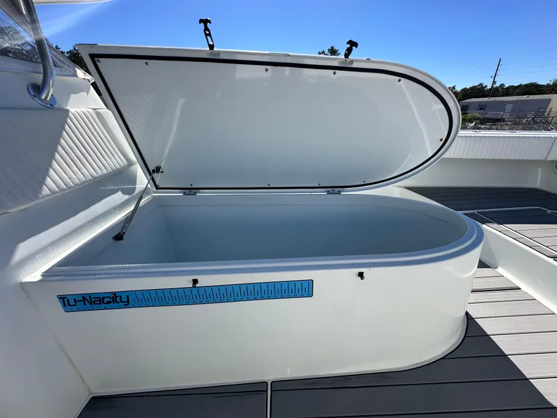 Slide: The Image of Open storage compartment on 2016 Freeman 37VH boat deck. - 46