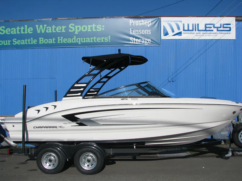 The Image of 2025 Chaparral 21 SSi boat on trailer, displayed at Seattle Water Sports. - 0