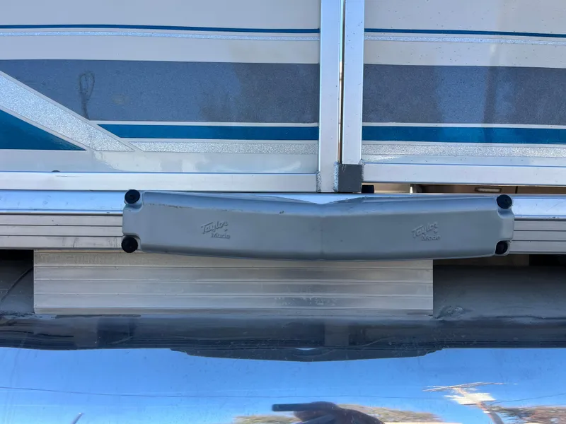 Slide: The Image of 2001 Sun Tracker PARTY BARGE 25 pontoon boat detail with blue and silver accents. - 10