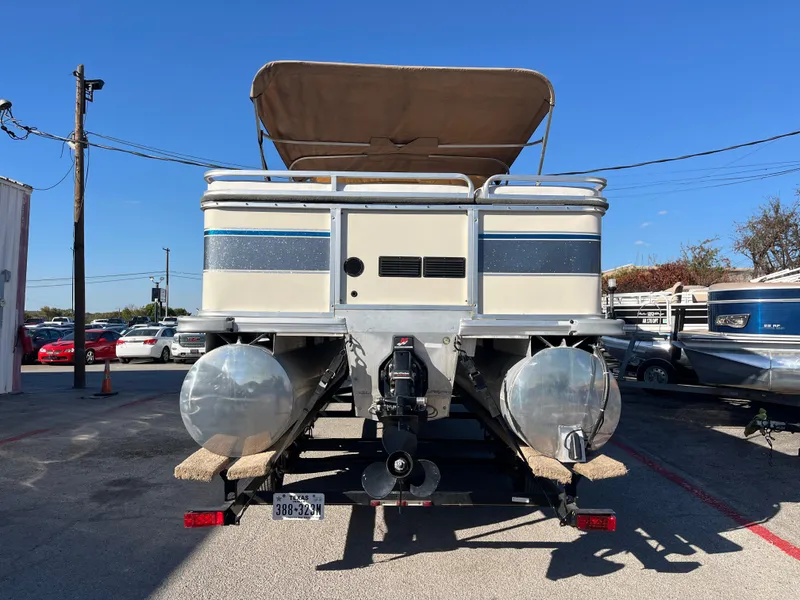 Slide: The Image of 2001 Sun Tracker PARTY BARGE 25 pontoon boat on trailer, rear view. - 13