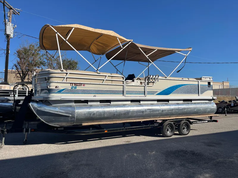 Slide: The Image of 2001 Sun Tracker PARTY BARGE 25 pontoon boat with canopy on trailer. - 2