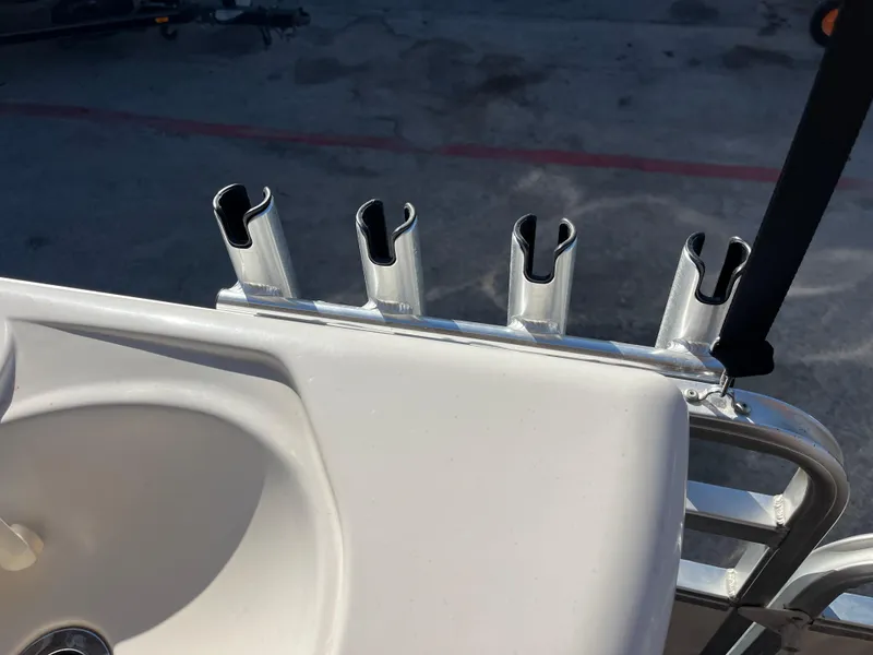 Slide: The Image of 2001 Sun Tracker PARTY BARGE 25 boat sink and rod holders. - 30