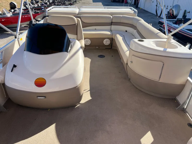 Slide: The Image of 2001 Sun Tracker PARTY BARGE 25 interior with spacious seating and helm. - 33