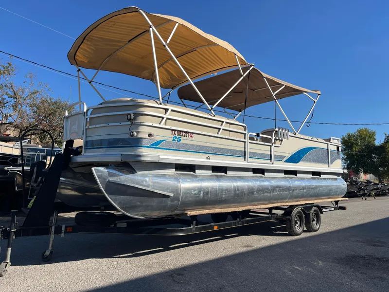 Slide: The Image of 2001 Sun Tracker PARTY BARGE 25 pontoon boat with canopy on trailer. - 7