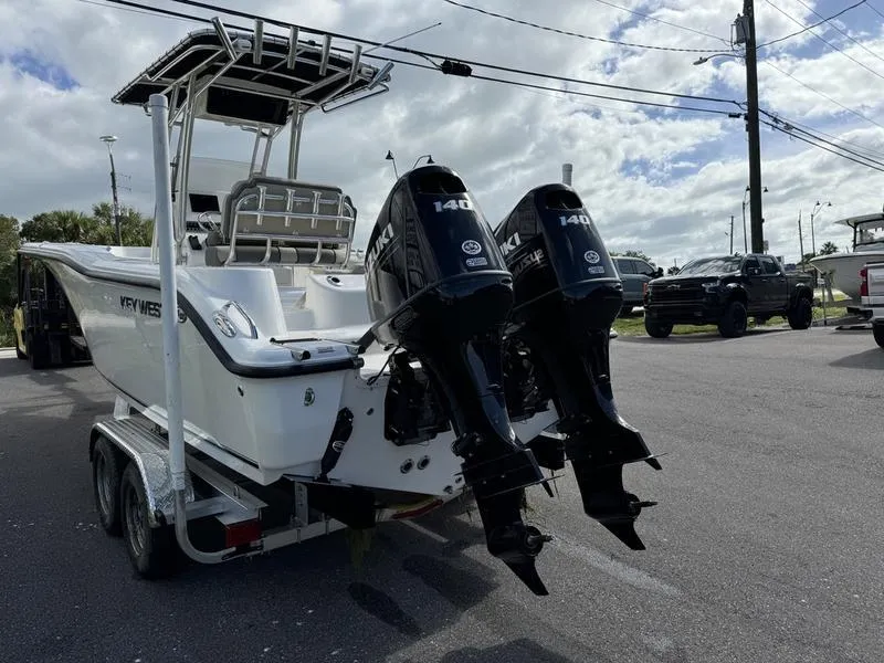 Slide: The Image of 2025 Key West 244 CC boat with dual 140 HP engines on trailer. - 4