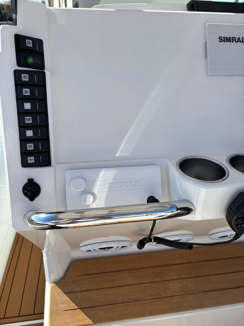 Slide: The Image of Control panel of 2024 Protector 330 Chase boat with Simrad electronics. - 20