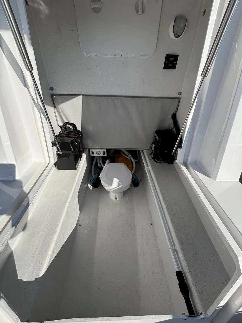 Slide: The Image of 2024 Protector 330 Chase boat interior with storage and equipment. - 28