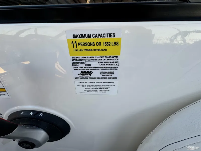 Slide: The Image of Bayliner DX2250 2020 boat capacity label, maximum 11 persons or 1552 lbs. - 11