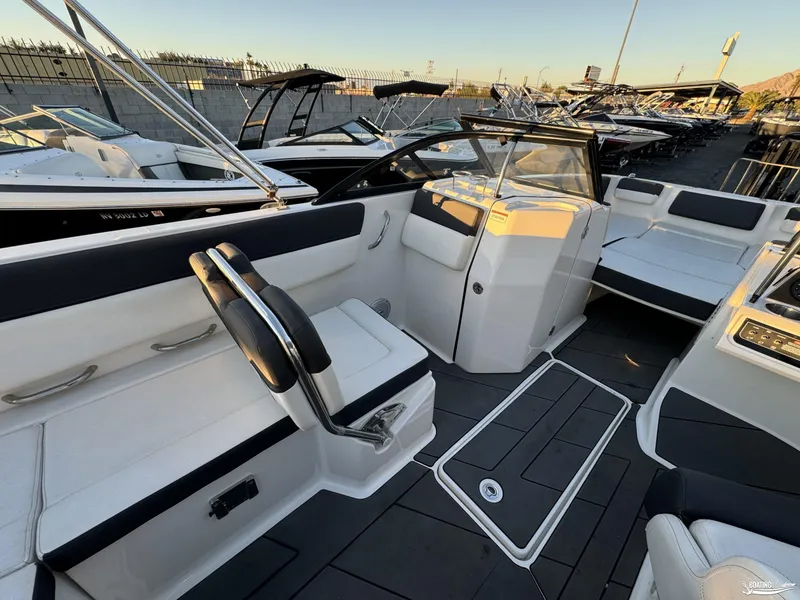 Slide: The Image of 2020 Bayliner DX2250 boat interior with sleek seating and modern design. - 6