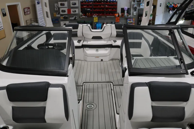 Slide: The Image of 2025 Yamaha Boats 195S interior with sleek seating and modern design. - 11