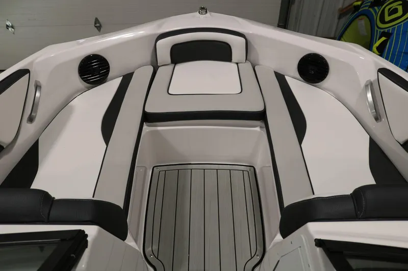 Slide: The Image of 2025 Yamaha Boats 195S interior with sleek seating and modern design. - 12