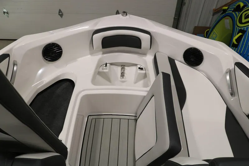 Slide: The Image of 2025 Yamaha Boats 195S interior with sleek seating and modern design. - 13