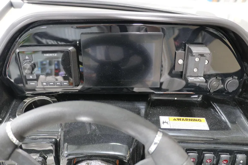 Slide: The Image of Dashboard of 2025 Yamaha Boats 195S with control panel and display screen. - 23