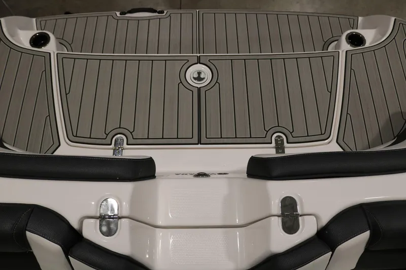Slide: The Image of 2025 Yamaha Boats 195S swim platform with sleek design and integrated cup holders. - 29