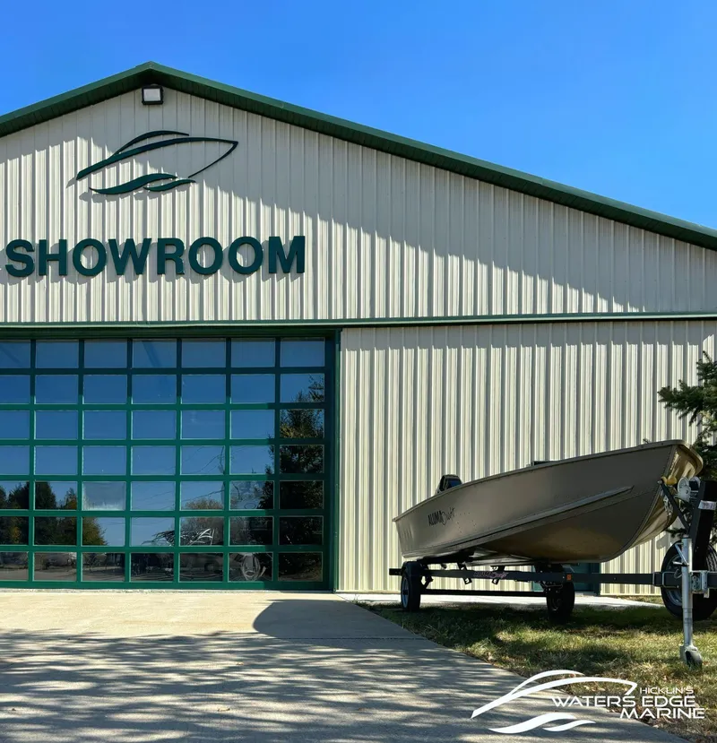 Slide: The Image of Showroom exterior with 2025 Yamaha Boats 195S on display, sunny day. - 33