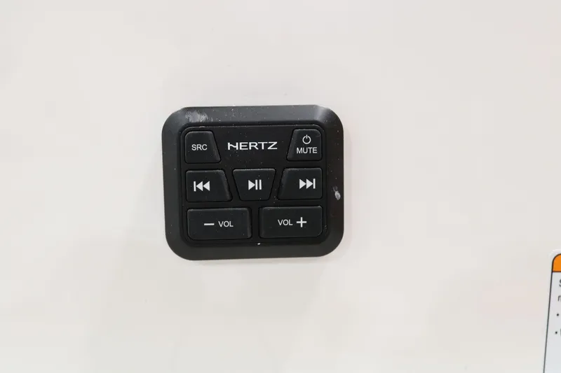 Slide: The Image of Audio control panel on 2025 Yamaha Boats 195S, featuring Hertz brand buttons. - 9