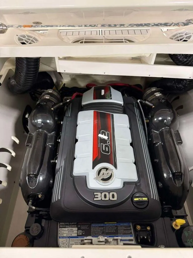 Slide: The Image of 2023 Sea Ray SPX 230 engine, featuring a powerful 6.2L V8, 300 horsepower. - 8