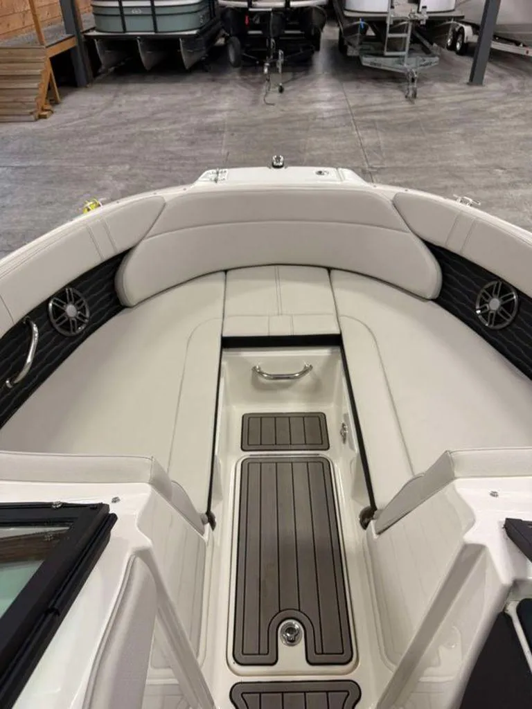 Slide: The Image of 2023 Sea Ray SPX 230 boat interior with sleek seating and modern design. - 9