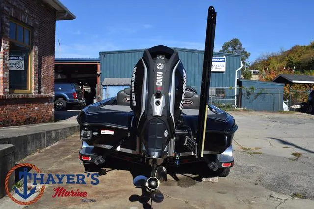 Slide: The Image of 2018 Triton 21 TrX boat with powerful outboard motor at Thayer's Marine. - 10