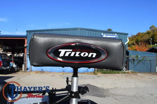 Slide: The Image of Triton 21 TrX 2018 boat seat at Thayer's Marine dealership. - 13