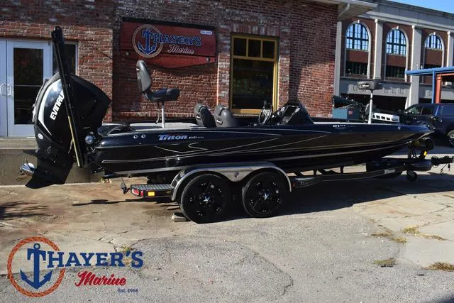 Slide: The Image of 2018 Triton 21 TrX boat at Thayer's Marine dealership. - 3
