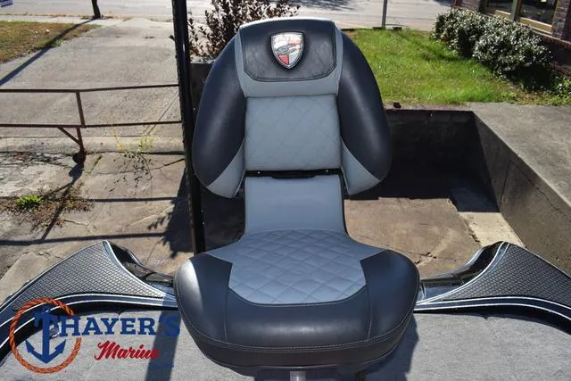 Slide: The Image of 2018 Triton 21 TrX boat seat with diamond stitching, displayed at Thayer's Marine. - 34