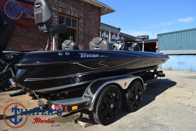 Slide: The Image of 2018 Triton 21 TrX bass boat at Thayer's Marine dealership. - 45