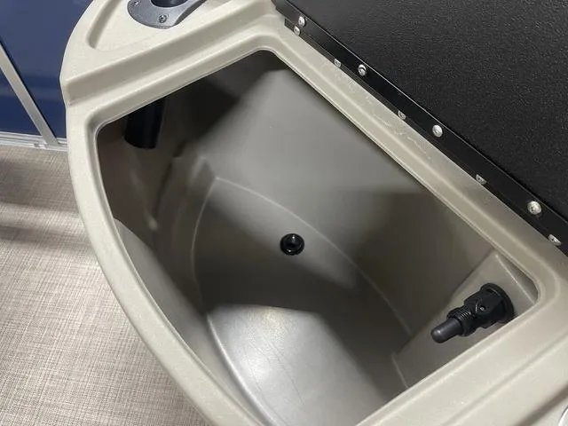 Slide: The Image of 2025 Sun Tracker Bass Buggy 18 DLX interior with two swivel seats and control panels. - 10