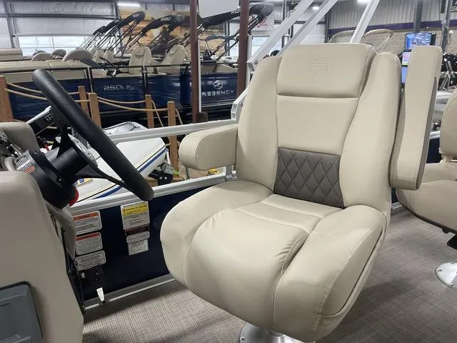 Slide: The Image of 2025 Sun Tracker Bass Buggy 18 DLX boat seat storage compartment. - 17