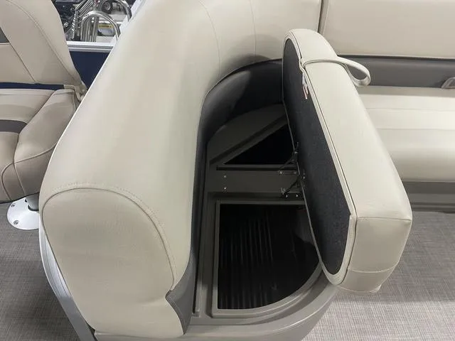 Slide: The Image of 2025 Sun Tracker BASS BUGGY® 18 DLX boat seat with open storage compartment. - 23