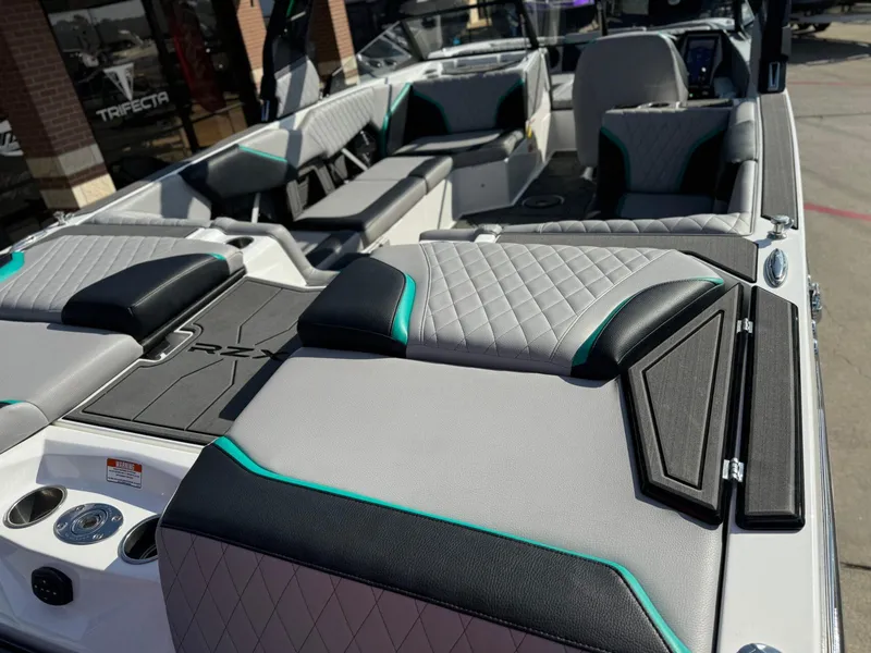 Slide: The Image of 2023 Tigé 24RZX boat interior with modern seating and sleek design. - 10