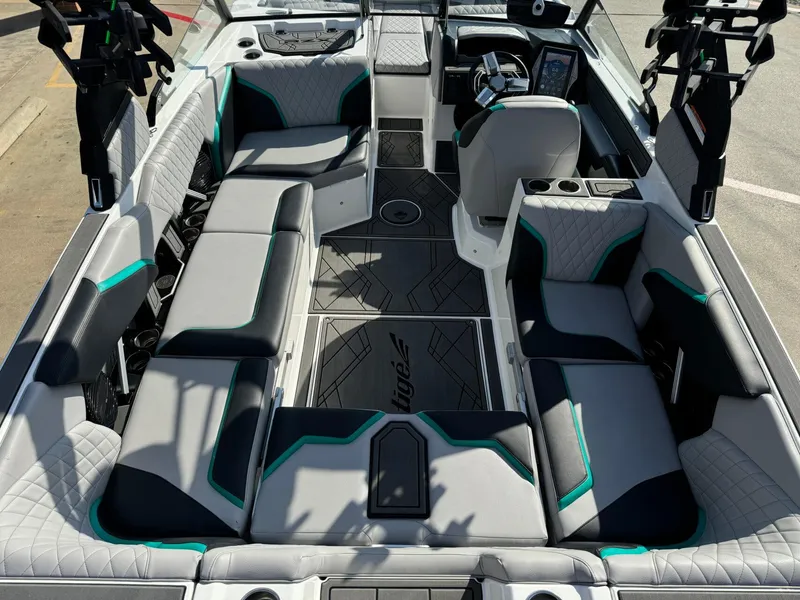 Slide: The Image of 2023 Tigé 24RZX boat interior with modern seating and sleek design. - 11