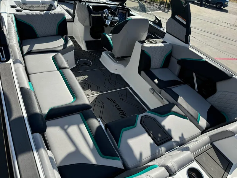 Slide: The Image of 2023 Tigé 24RZX boat interior with modern seating and sleek design. - 12