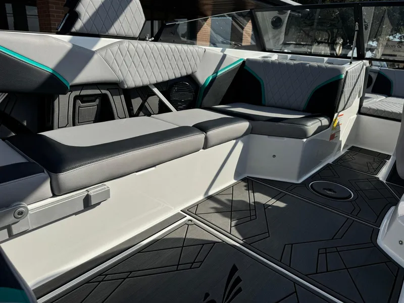 Slide: The Image of 2023 Tigé 24RZX boat interior with modern seating and stylish flooring. - 13