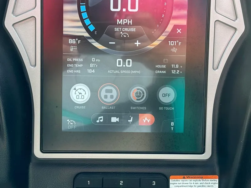 Slide: The Image of 2023 Tigé 24RZX dashboard display showing speed, temperature, and control settings. - 17