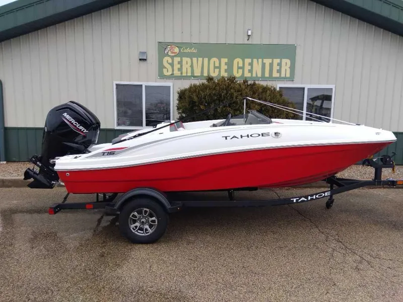 The Image of 2025 Tahoe T16 boat in red and white at service center. - 0