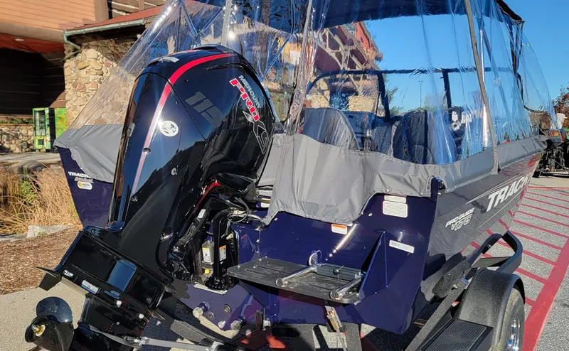Slide: The Image of 2025 Tracker Pro Guide V-175 Combo boat with powerful outboard motor. - 3