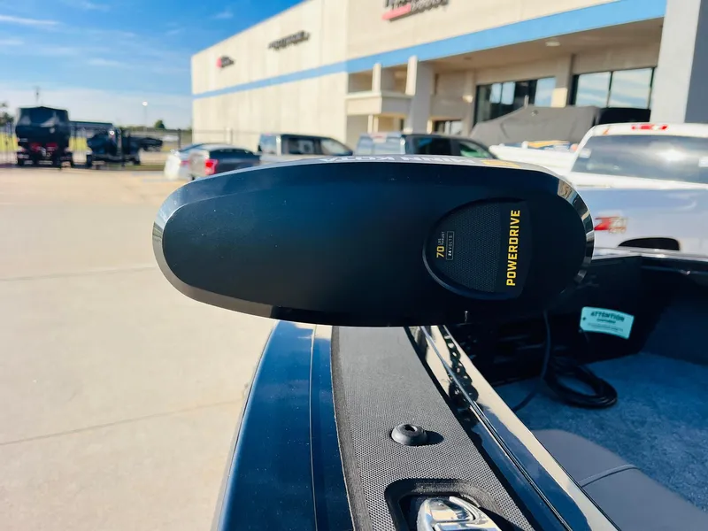 Slide: The Image of 2025 Tracker Targa V-18 Combo boat with PowerDrive motor in dealership lot. - 13