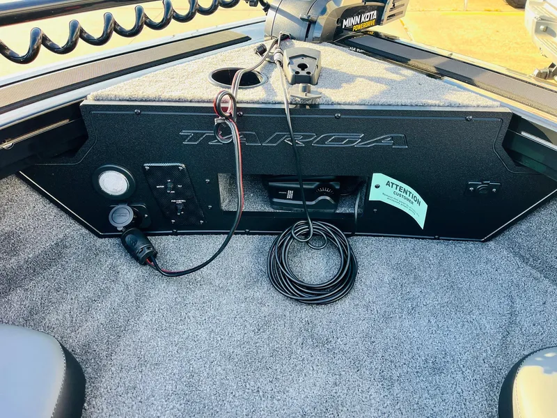 Slide: The Image of 2025 Tracker Targa V-18 Combo boat interior with control panel and wiring. - 14