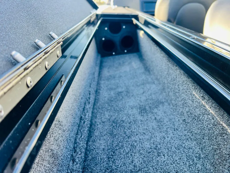 Slide: The Image of Interior view of 2025 Tracker Targa V-18 Combo boat storage compartment. - 42