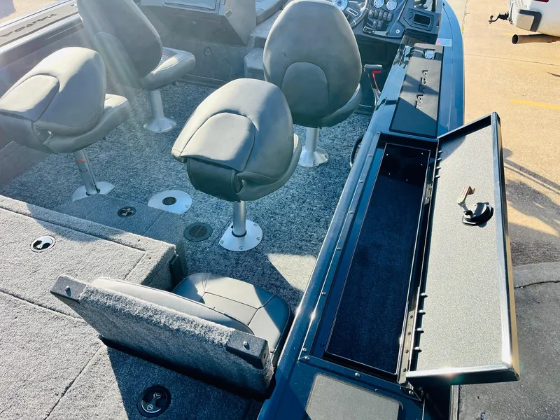Slide: The Image of 2025 Tracker Targa V-18 Combo boat interior with seating and storage compartments. - 43