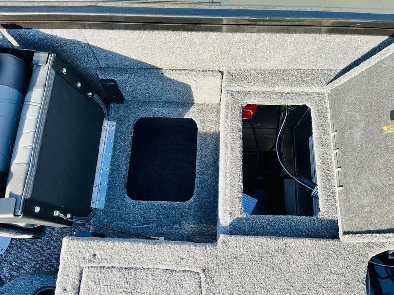 Slide: The Image of 2025 Tracker Targa V-18 Combo boat interior storage compartments. - 48