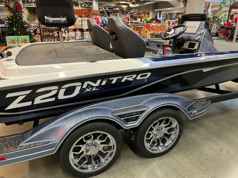 Slide: The Image of 2025 Nitro Z20 XL Pro boat with sleek design and shiny chrome wheels. - 2