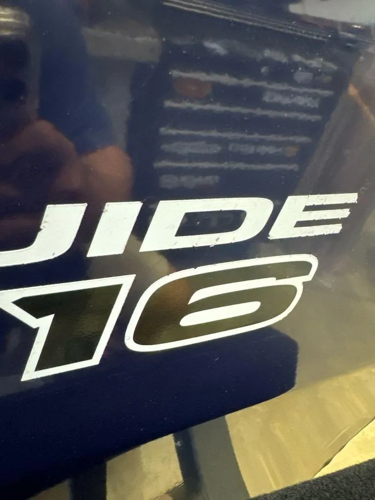 Slide: The Image of Close-up of 2025 Tracker Pro Guide V-16 SC boat decal. - 8