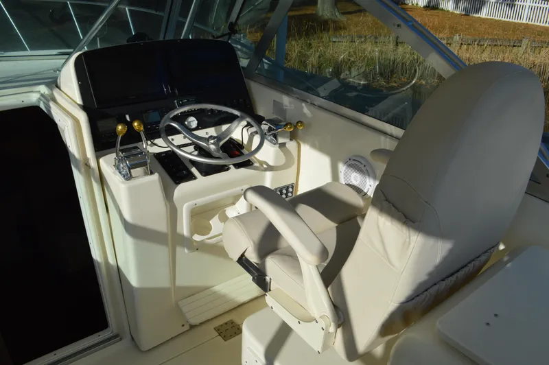 Slide: The Image of Pursuit 3000 Express - Helm Seat - 23