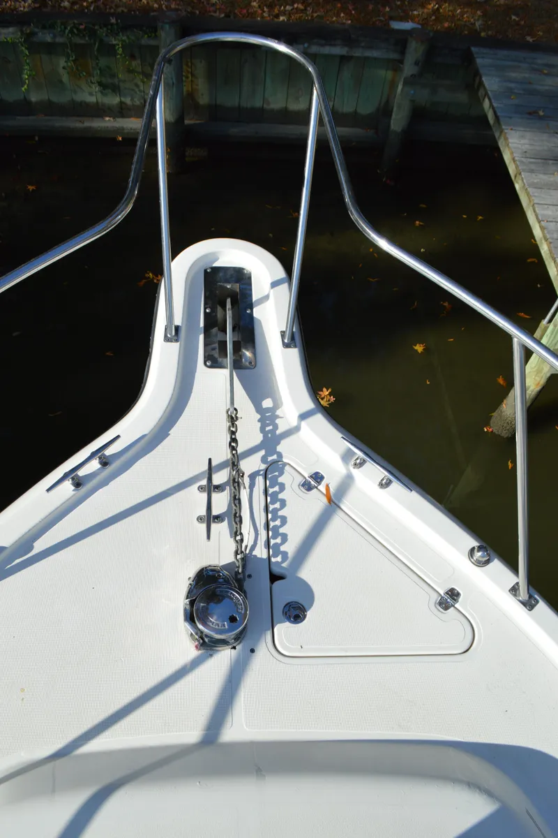 Slide: The Image of Pursuit 3000 Express - Bow w/ Windlass and Anchor - 6
