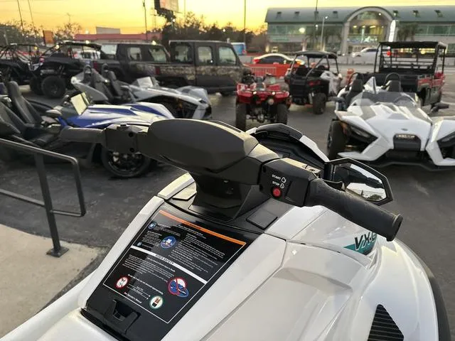 Slide: The Image of 2025 Yamaha Marine Waverunner VX-C in white and black, displayed in a showroom with other vehicles. - 9