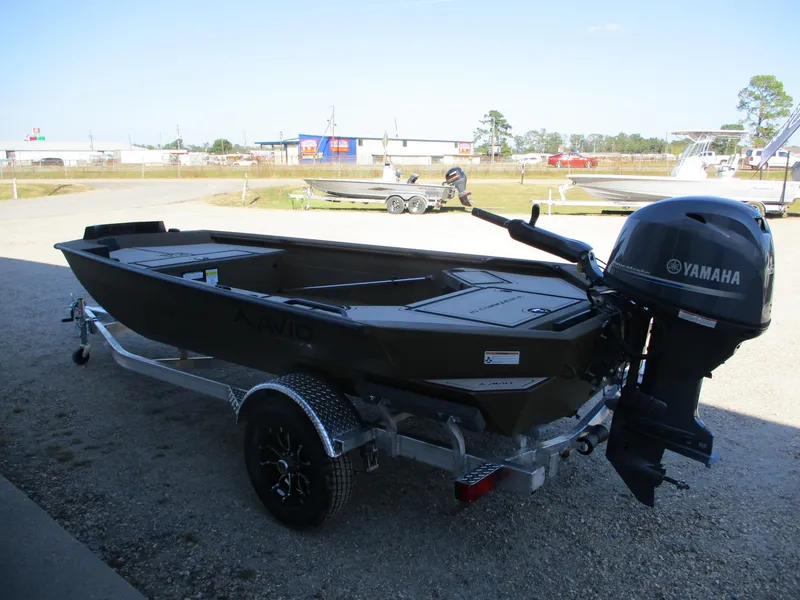 Slide: The Image of 2025 Avid 16 Commander boat with Yamaha outboard motor on trailer. - 4